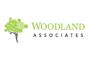 Woodland Associates logo